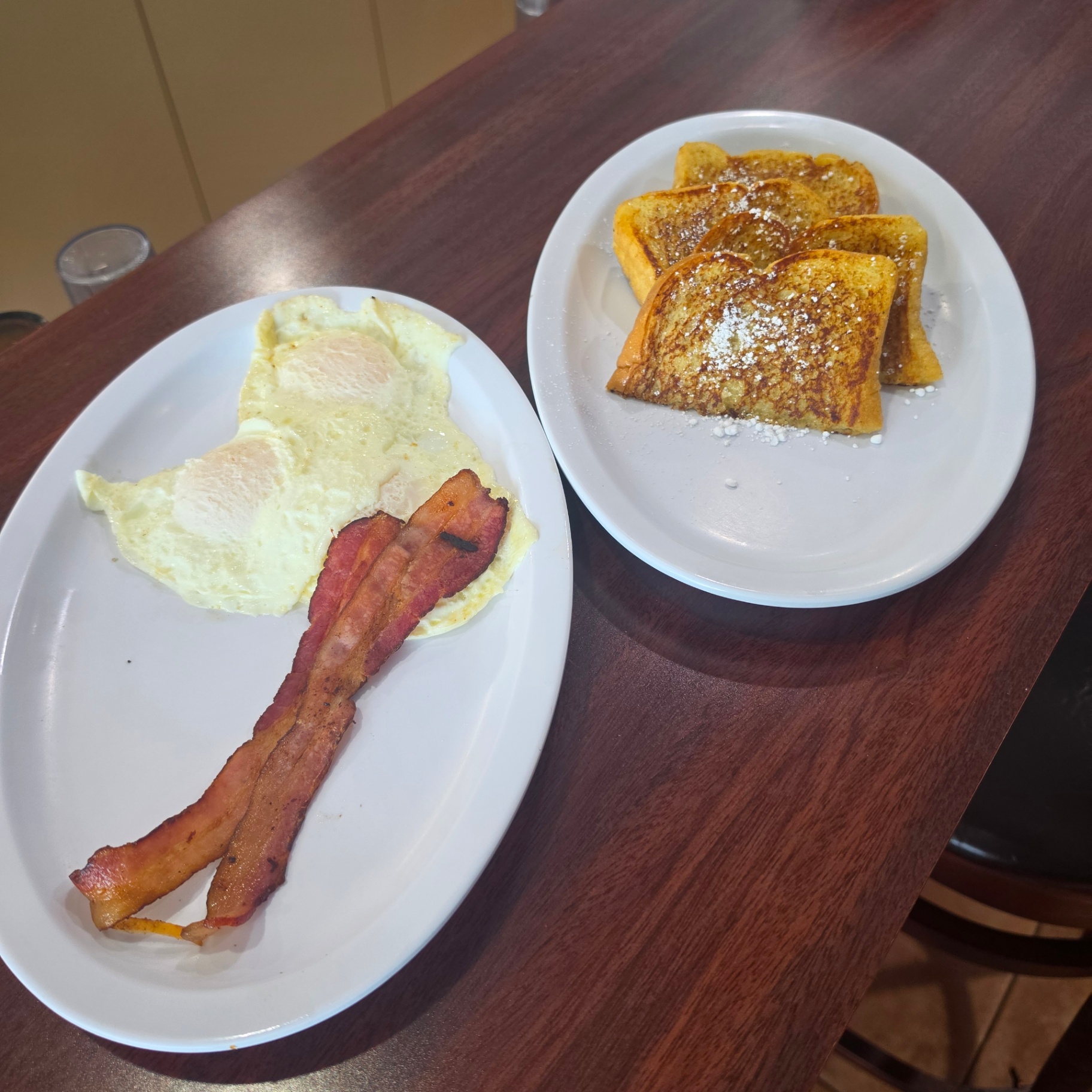 Eggs, bacon and French toast breakfast platter