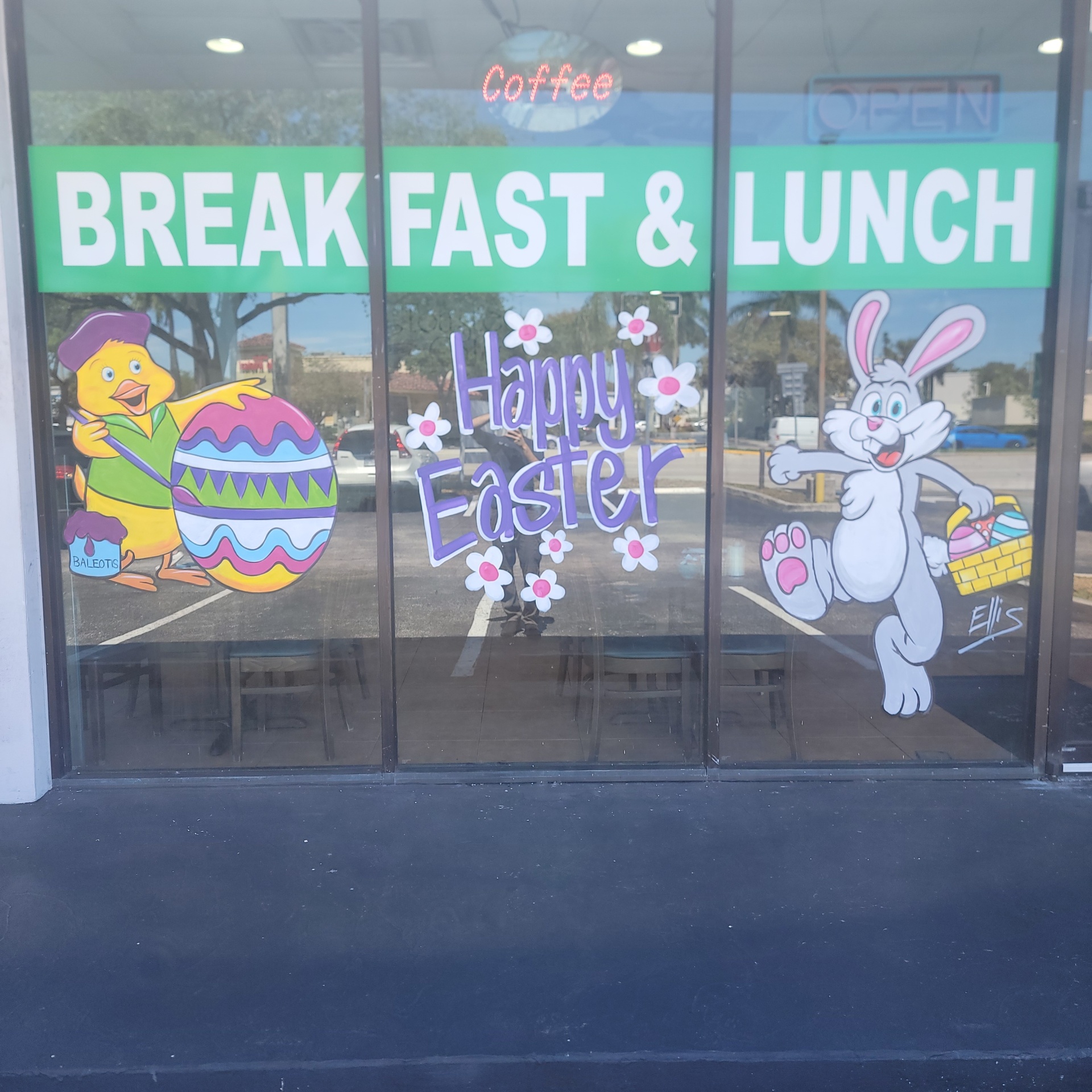 Hand-painted Happy Easter window with bunny and chick