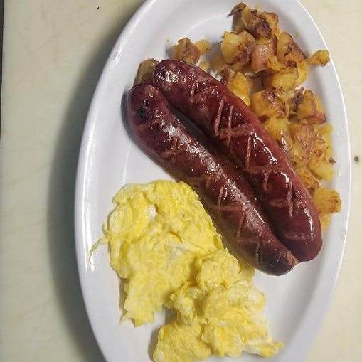 Grilled sausage links with scrambled eggs and home fries